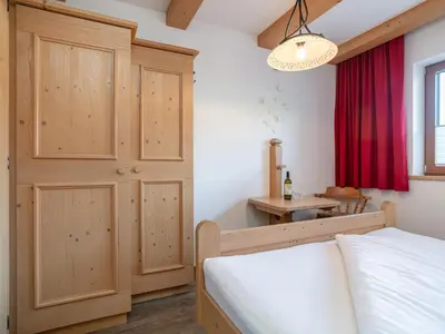 Ein Bett oder Betten in einem Zimmer der Unterkunft Landhaus Marchfeld Top 4