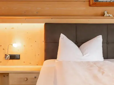 Ein Bett oder Betten in einem Zimmer der Unterkunft Landhaus Marchfeld Top 2