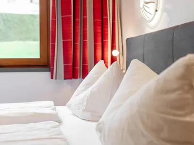 Ein Bett oder Betten in einem Zimmer der Unterkunft Landhaus Marchfeld Top 1