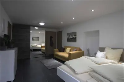 Ein Bett oder Betten in einem Zimmer der Unterkunft Jaegerhaus Appartement Georg