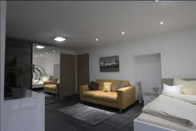 Ein Bett oder Betten in einem Zimmer der Unterkunft Jaegerhaus Appartement Georg
