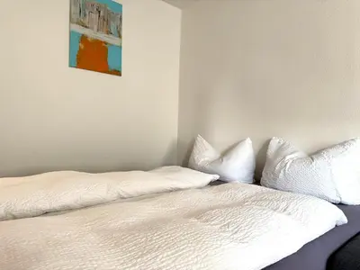 Ein Bett oder Betten in einem Zimmer der Unterkunft Jasmina Appartments