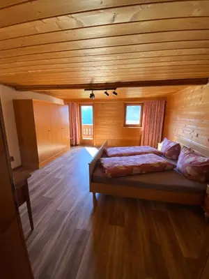 Ein Bett oder Betten in einem Zimmer der Unterkunft Talgenbichl