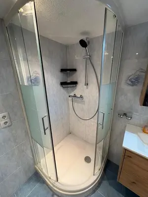 Ein Badezimmer in der Unterkunft Talgenbichl
