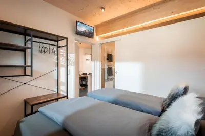 Ein Bett oder Betten in einem Zimmer der Unterkunft Ferienwohnungen N & C