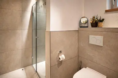 Ein Badezimmer in der Unterkunft BLACKSYTLE - by AlpenLuxus Collection