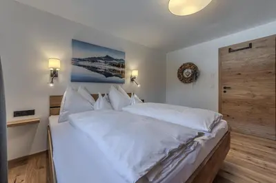 Ein Bett oder Betten in einem Zimmer der Unterkunft Waltenberghof