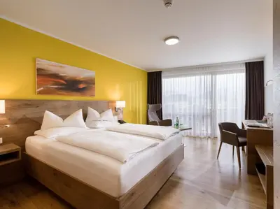 Ein Bett oder Betten in einem Zimmer der Unterkunft DAS SIEBEN - Adults Only