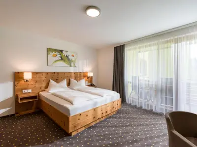 Ein Bett oder Betten in einem Zimmer der Unterkunft DAS SIEBEN - Adults Only