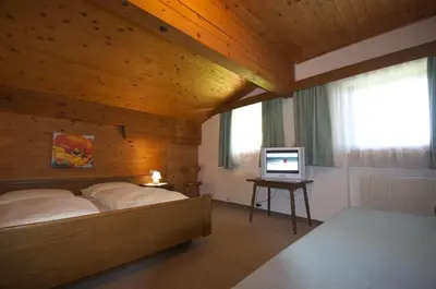 Ein Bett oder Betten in einem Zimmer der Unterkunft Dreiländerhaus
