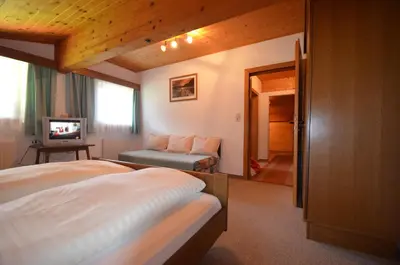 Ein Bett oder Betten in einem Zimmer der Unterkunft Dreiländerhaus