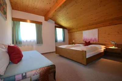 Ein Bett oder Betten in einem Zimmer der Unterkunft Dreiländerhaus