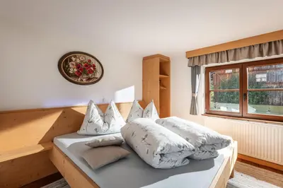 Ein Bett oder Betten in einem Zimmer der Unterkunft Hitscherhof - Abart
