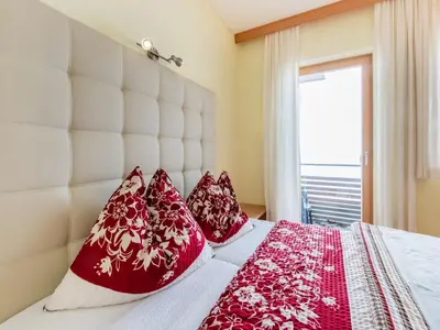 Ein Bett oder Betten in einem Zimmer der Unterkunft Apartment in Aschau near Kaltenbach Ski Lift