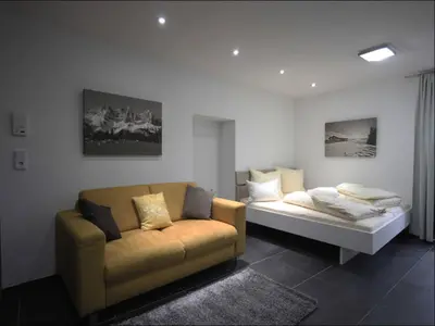 Ein Bett oder Betten in einem Zimmer der Unterkunft Alpine Escape in Hopfgarten