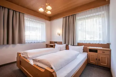 Ein Bett oder Betten in einem Zimmer der Unterkunft Gästehaus Appartement Höllwarth