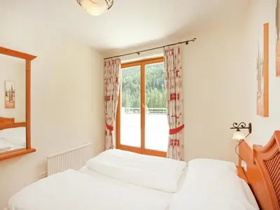 Ein Bett oder Betten in einem Zimmer der Unterkunft Chalet in Saalbach near Ski Lift & Sauna