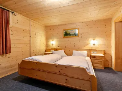 Ein Bett oder Betten in einem Zimmer der Unterkunft Am Bauernhof Top 1 und 2