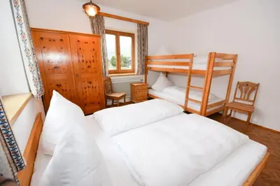 Ein Bett oder Betten in einem Zimmer der Unterkunft Appartement Aschau