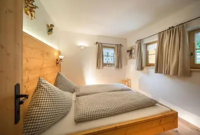 Ein Bett oder Betten in einem Zimmer der Unterkunft Bergchalet Klausner Kuschelsuite