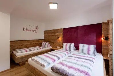 Ein Bett oder Betten in einem Zimmer der Unterkunft Zur Schönsten Aussicht
