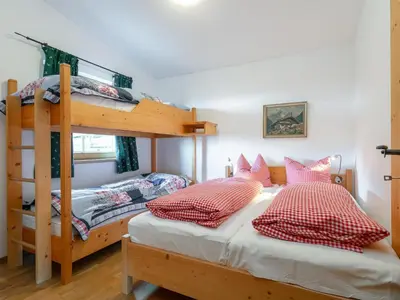 Ein Bett oder Betten in einem Zimmer der Unterkunft Schneeberghütte