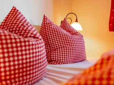 Ein Bett oder Betten in einem Zimmer der Unterkunft Schneeberghütte