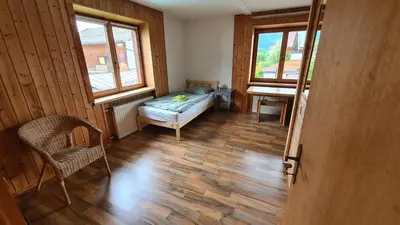 Ein Bett oder Betten in einem Zimmer der Unterkunft Geräumiges Apartment in Kufstein mit Parkplatz