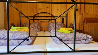 Ein Bett oder Betten in einem Zimmer der Unterkunft Geräumiges Apartment in Kufstein mit Parkplatz