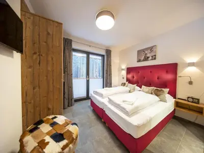 Ein Bett oder Betten in einem Zimmer der Unterkunft Chalet in Neukirchen near Wildkogel Ski Arena