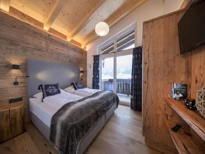 Ein Bett oder Betten in einem Zimmer der Unterkunft Nationalpark Chalet Hohe Warte