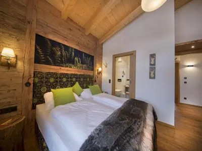 Ein Bett oder Betten in einem Zimmer der Unterkunft Nationalpark Chalet Hohe Warte