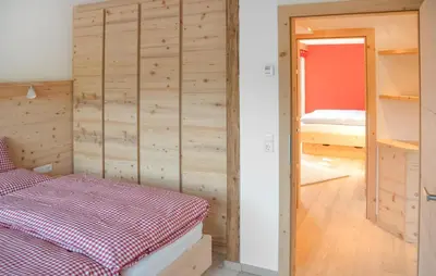 Ein Bett oder Betten in einem Zimmer der Unterkunft Sunnplatzl In Ellmau
