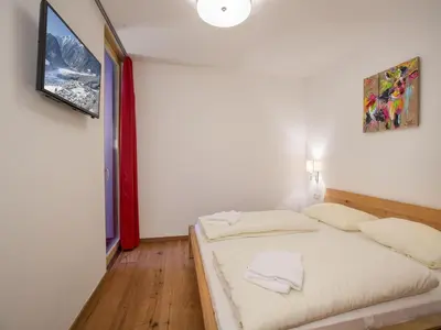 Ein Bett oder Betten in einem Zimmer der Unterkunft Apartment in Neukirchen by Ski Lift & Sauna