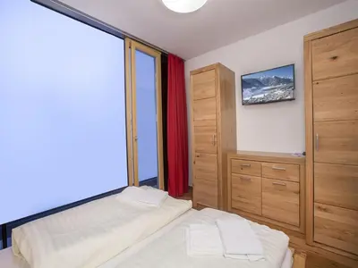 Ein Bett oder Betten in einem Zimmer der Unterkunft Apartment in Neukirchen by Ski Lift & Sauna