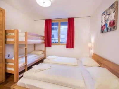Ein Bett oder Betten in einem Zimmer der Unterkunft Apartment in Neukirchen by Ski Lift & Sauna