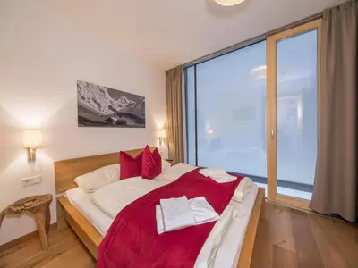 Ein Bett oder Betten in einem Zimmer der Unterkunft Apartment in Neukirchen near Ski Lift