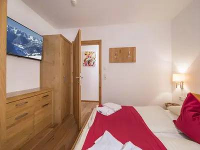 Ein Bett oder Betten in einem Zimmer der Unterkunft Apartment in Neukirchen near Ski Lift
