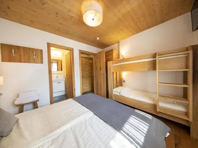 Ein Bett oder Betten in einem Zimmer der Unterkunft Apartment in Neukirchen near Ski Lift