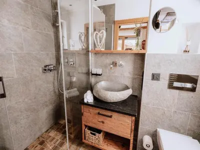 Ein Badezimmer in der Unterkunft Nationalpark Chalet Tulpspitze
