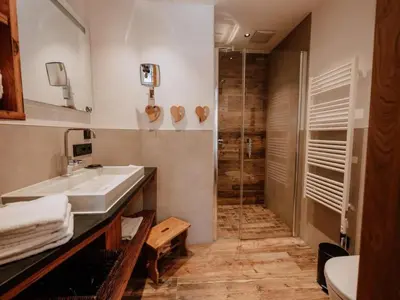 Ein Badezimmer in der Unterkunft Nationalpark Chalet Tulpspitze