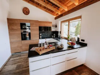 Küche/Küchenzeile in der Unterkunft Nationalpark Chalet Tulpspitze