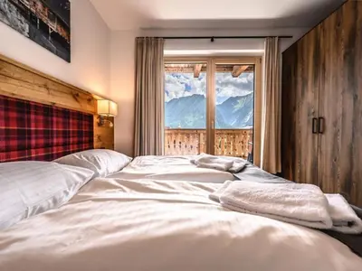 Ein Bett oder Betten in einem Zimmer der Unterkunft Nationalpark Chalet Schwarzes Hörndl