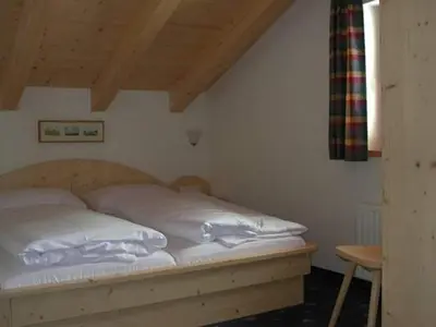 Ein Bett oder Betten in einem Zimmer der Unterkunft Chalet in Königsleiten near Ski Lift