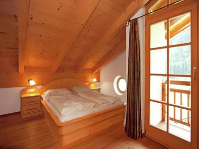 Ein Bett oder Betten in einem Zimmer der Unterkunft Chalet in Königsleiten near Ski Bus & Pool