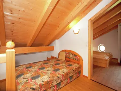 Ein Bett oder Betten in einem Zimmer der Unterkunft Chalet in Königsleiten near Ski Bus & Pool