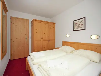 Ein Bett oder Betten in einem Zimmer der Unterkunft Chalet in Königsleiten near Zillertal Ski Area