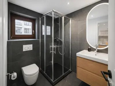 Ein Badezimmer in der Unterkunft Luxury Central Kirchberg