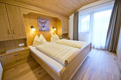 Ein Bett oder Betten in einem Zimmer der Unterkunft Haus Sonnwend