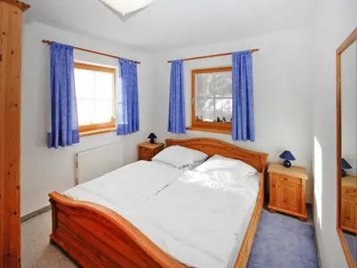 Ein Bett oder Betten in einem Zimmer der Unterkunft Chalet in Königsleiten near Zillertal Arena